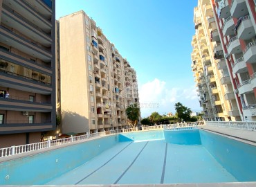 Stylish two bedroom apartment, 110m², in a new residence with a swimming pool in the Tomyuk area, Mersin ID-15158 фото-17