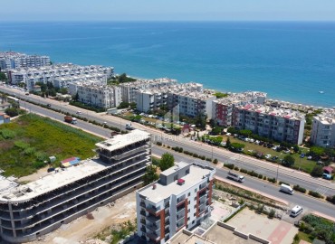 One-bedroom apartment, 50m², in a new building, in the district center of Erdemli, 150m from the sea ID-13467 фото-3