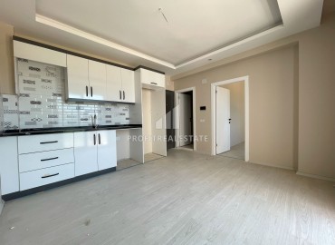 One-bedroom apartment, 50m², in a new building, in the district center of Erdemli, 150m from the sea ID-13467 фото-6