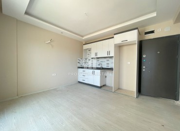 One-bedroom apartment, 50m², in a new building, in the district center of Erdemli, 150m from the sea ID-13467 фото-7