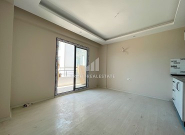 One-bedroom apartment, 50m², in a new building, in the district center of Erdemli, 150m from the sea ID-13467 фото-8
