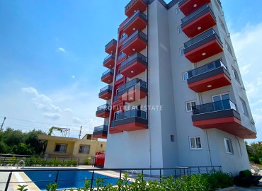 One-bedroom apartment, 55m², in a new residence in 2023, with a swimming pool, in Erdemli, Arpacbakhsis ID-15177 фото-1
