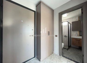 One-bedroom apartment, 55m², in a new residence in 2023, with a swimming pool, in Erdemli, Arpacbakhsis ID-15177 фото-2