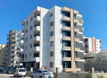 Apartment 2+1, 90 m², in a new building at the commissioning stage in the regional center of Erdemli - Akdeniz district ID-15178 фото-1
