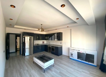 Квартира 2+1, 90м², в новостройке на этапе ввода в эксплуатацию в районном центре Эрдемли – район Акдениз ID-15178 фото-9
