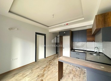 Apartment 1+1, 55m², in a residence with a swimming pool at the commissioning stage, in the Mersin - Tomyuk area ID-15183 фото-5