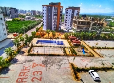 New one bedroom apartment, 60m², in a residence with good facilities in Mezitli, Mersin ID-15190 фото-15