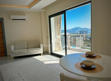 Стильные двухкомнатные апартаменты с видом на горы и море, в резиденции 2022 года, в Махмутларе, 58,8 м2 ID-15209 фото-3