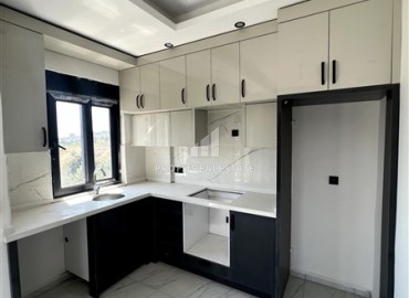 Двухкомнатная квартира 45м², с чистовой отделкой, без мебели, в новом жилом комплексе в Демирташе, Аланья ID-15212 фото-2