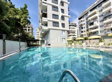 Designer apartment 1+1, 50m², in a new residence with facilities, 300m from the sea in Mahmutlar, Alanya ID-15215 фото-1