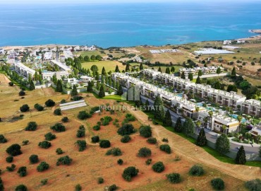 Масштабный инвестиционный проект в 200м от моря: квартиры и виллы 41-100м², Татлысу, Северный Кипр ID-15225 фото-18