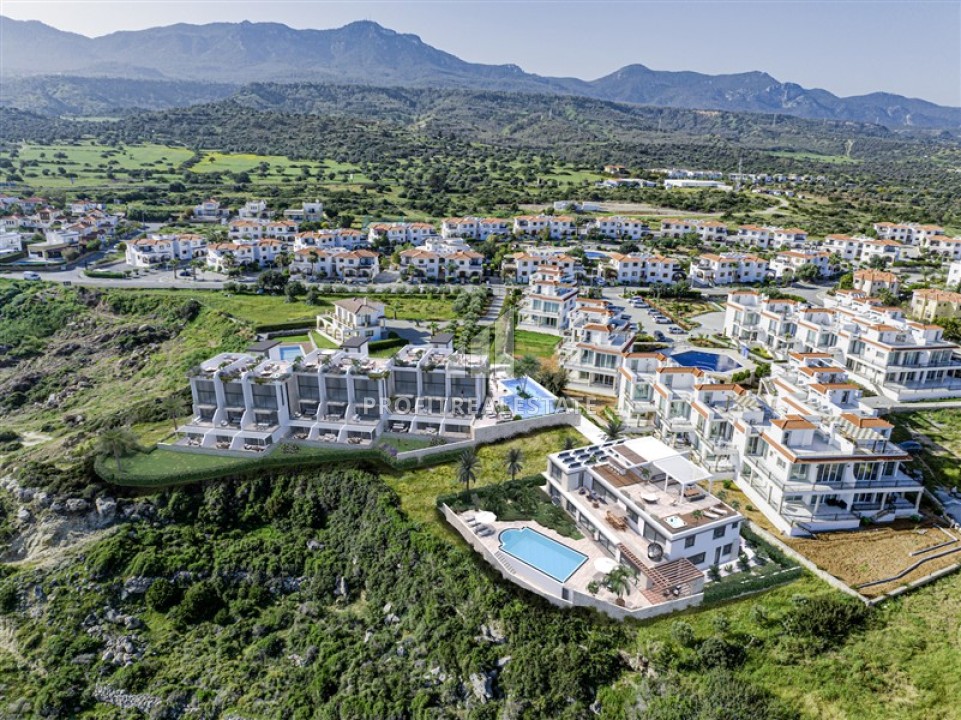 Инвестиционный проект класса люкс: апартаменты и виллы 95-270м², на берегу Средиземного моря, Эсентепе, Северный Кипр ID-15238 фото-1