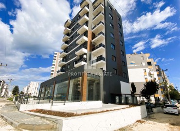 One bedroom apartment, 55m², in a new building 550m from the sea, in the center of Teje, Mersin ID-15246 фото-1