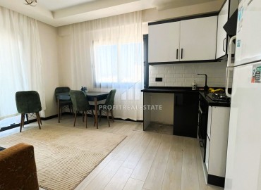 One bedroom apartment, 55m², in a new building 550m from the sea, in the center of Teje, Mersin ID-15246 фото-4