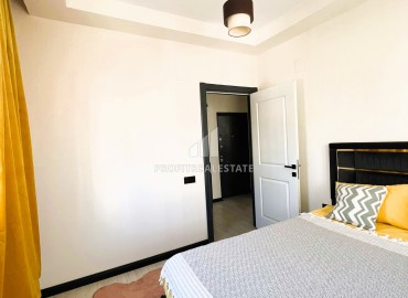 Апартаменты с одной спальней, 55м², в новом доме в 550м от моря, в центре Тедже, Мерсин ID-15246 фото-9