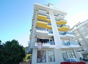 Трехкомнатная квартира в новостройке с чистовой отделкой, без мебели, с видом на море в Демирташе, Аланья ID-12209 фото-1