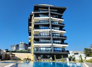 One-bedroom apartment 65m², unfurnished, with kitchenette, in a new residence with facilities in Avsallar, Alanya ID-15262 фото-1