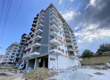 Inexpensive one-bedroom apartment 58m², unfurnished, in the final stage of construction in Avsallar, Alanya ID-15263 фото-2