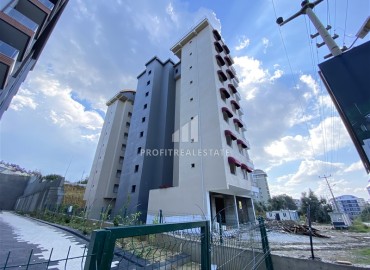Недорогая двухкомнатная квартира 58м², без мебели, на финальном этапе строительства в Авсалларе, Аланья ID-15263 фото-3