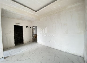 Недорогая двухкомнатная квартира 58м², без мебели, на финальном этапе строительства в Авсалларе, Аланья ID-15263 фото-9