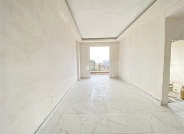Недорогая двухкомнатная квартира 58м², без мебели, на финальном этапе строительства в Авсалларе, Аланья ID-15263 фото-10