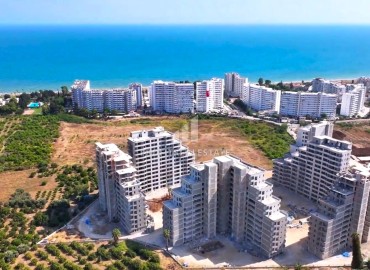 Apartment 1+1, 70 m², in a large-scale luxury residence under construction in the Tomyuk area, Erdemli ID-15268 фото-2