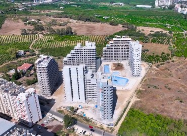 Apartment 1+1, 70 m², in a large-scale luxury residence under construction in the Tomyuk area, Erdemli ID-15268 фото-4