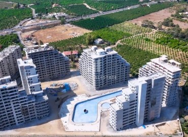 Apartment 1+1, 70 m², in a large-scale luxury residence under construction in the Tomyuk area, Erdemli ID-15268 фото-5