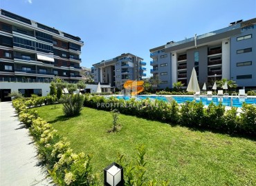 Стильная двухкомнатная квартира, 50м², с выходом в сад в комплексе премиум класса в Каргыджаке, 700м от моря ID-15272 фото-1