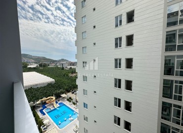 Меблированные двухкомнатные апартаменты, в 400 метрах от моря, Махмутлар, Аланья, 55 м2 ID-15286 фото-7