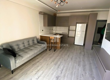 Двухкомнатные апартаменты, 55м², с мебелью, в новом комплексе в Арпачбахшиш, Эрдемли, в 200м от моря ID-15287 фото-5