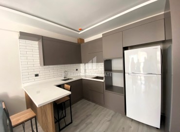 Двухкомнатные апартаменты, 55м², с мебелью, в новом комплексе в Арпачбахшиш, Эрдемли, в 200м от моря ID-15287 фото-6