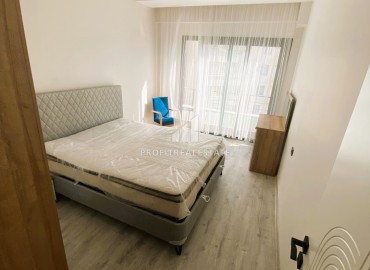 Двухкомнатные апартаменты, 55м², с мебелью, в новом комплексе в Арпачбахшиш, Эрдемли, в 200м от моря ID-15287 фото-7