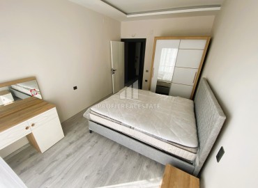 Двухкомнатные апартаменты, 55м², с мебелью, в новом комплексе в Арпачбахшиш, Эрдемли, в 200м от моря ID-15287 фото-9