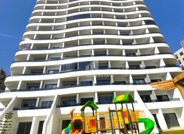 Новая двухкомнатная квартира, 65м², в комфортабельной новой резиденции 2023 года в Арпачбахшиш, Эрдемли ID-15288 фото-2