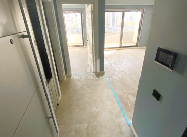 Новая двухкомнатная квартира, 65м², в комфортабельной новой резиденции 2023 года в Арпачбахшиш, Эрдемли ID-15288 фото-3