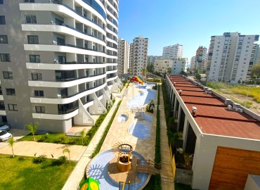 New one-bedroom apartment, 65m², in a comfortable new residence 2023 in Arpacbakhsis, Erdemli ID-15288 фото-14