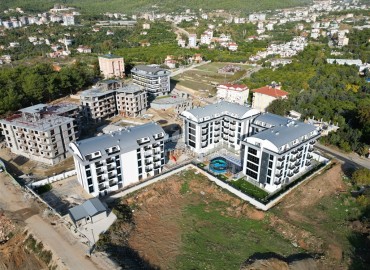 Furnished one bedroom apartment, 50m², in a cozy premium residence in Oba, Alanya ID-15293 фото-1