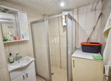 Недорогая меблированная двухкомнатная квартира 65м², с отдельной кухней, в 300 метрах от моря, Махмутлар, Аланья ID-15309 фото-13