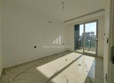 Новая квартира с одной спальней, 58м². в новостройке с обширной инфраструктурой в районе Махмутлар, Алания ID-15311 фото-5