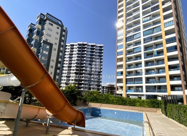 Готовая к проживанию, квартира 1+1, 55м², с остекленными балконами и видом на море в Арпачбахшиш, Эрдемли ID-15319 фото-1