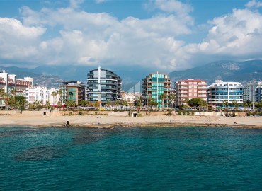 Luxury one-bedroom apartment, 65m², on the first coastline in Oba, Alanya ID-15321 фото-2