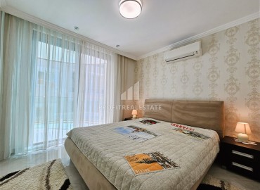Luxury one-bedroom apartment, 65m², on the first coastline in Oba, Alanya ID-15321 фото-10