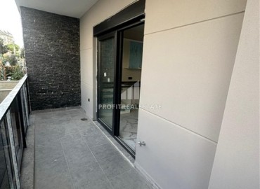 Двухкомнатная квартира, 48м², в комплексе с зимним бассейном на этапе ввода в эксплуатацию в центре Алании ID-15329 фото-8