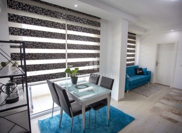 Inexpensive 1+1 apartment, with furniture and appliances, in a residential building without a swimming pool, Mahmutlar, Alanya, 55 m2 ID-15330 фото-3