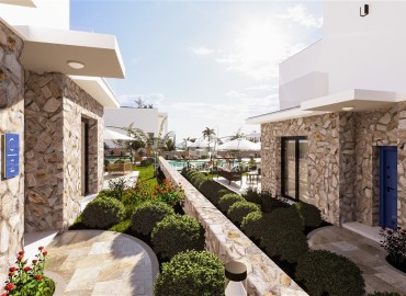 Привлекательное предложение для инвестиций: апартаменты, студии и садовые дуплексы 52-169м², на берегу моря, в Эсентепе, Северный Кипр ID-15342 фото-11