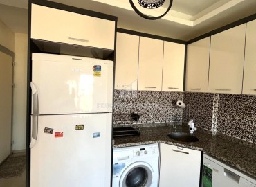 Furnished one-bedroom apartment, 60m², in a residence with comfortable facilities in the Mersin – Tomyuk area ID-15344 фото-5
