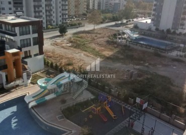 Ready to move in, one bedroom apartment, 60m², in a comfortable new residence in Arpacbakhsis, Erdemli ID-15346 фото-11