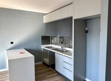 Новая квартира с одной спальней, 65м², в комплексе премиум класса в Арпачбахшиш, Эрдемли ID-15347 фото-4