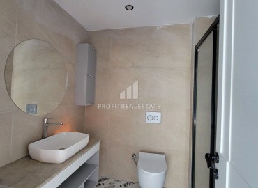 Новая квартира с одной спальней, 65м², в комплексе премиум класса в Арпачбахшиш, Эрдемли ID-15347 фото-9